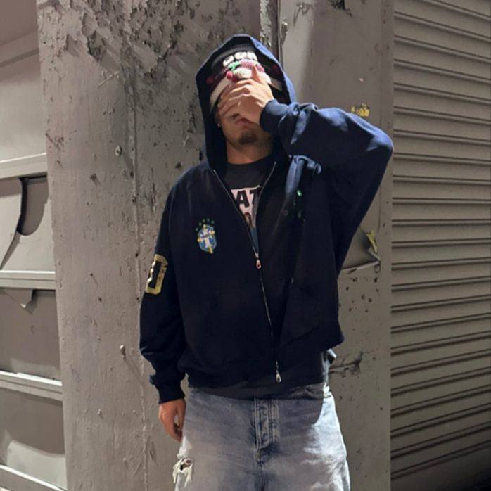 man wearing vintage 90s hoodie