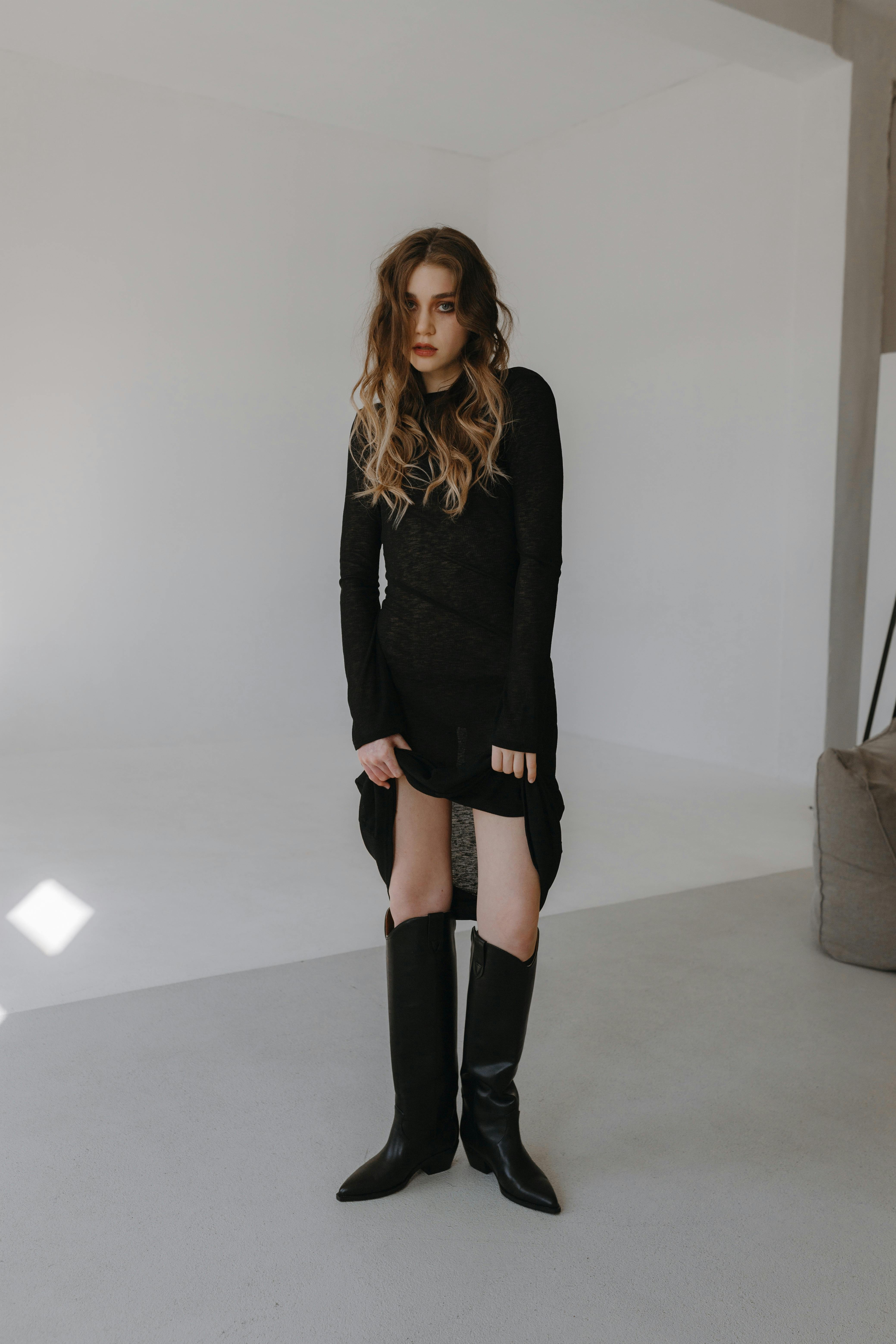 model wearing black dress