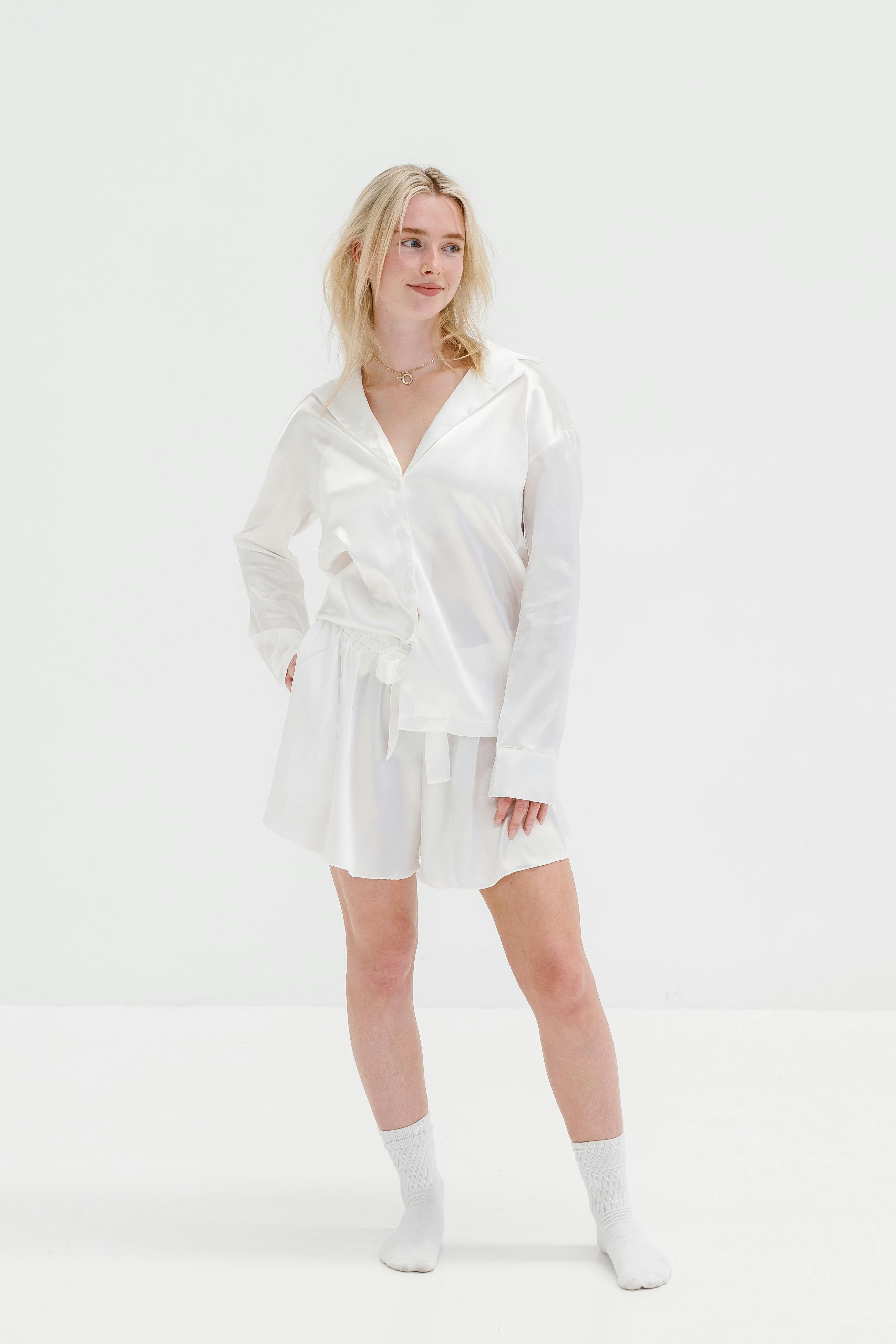 female model posing with old money clothes