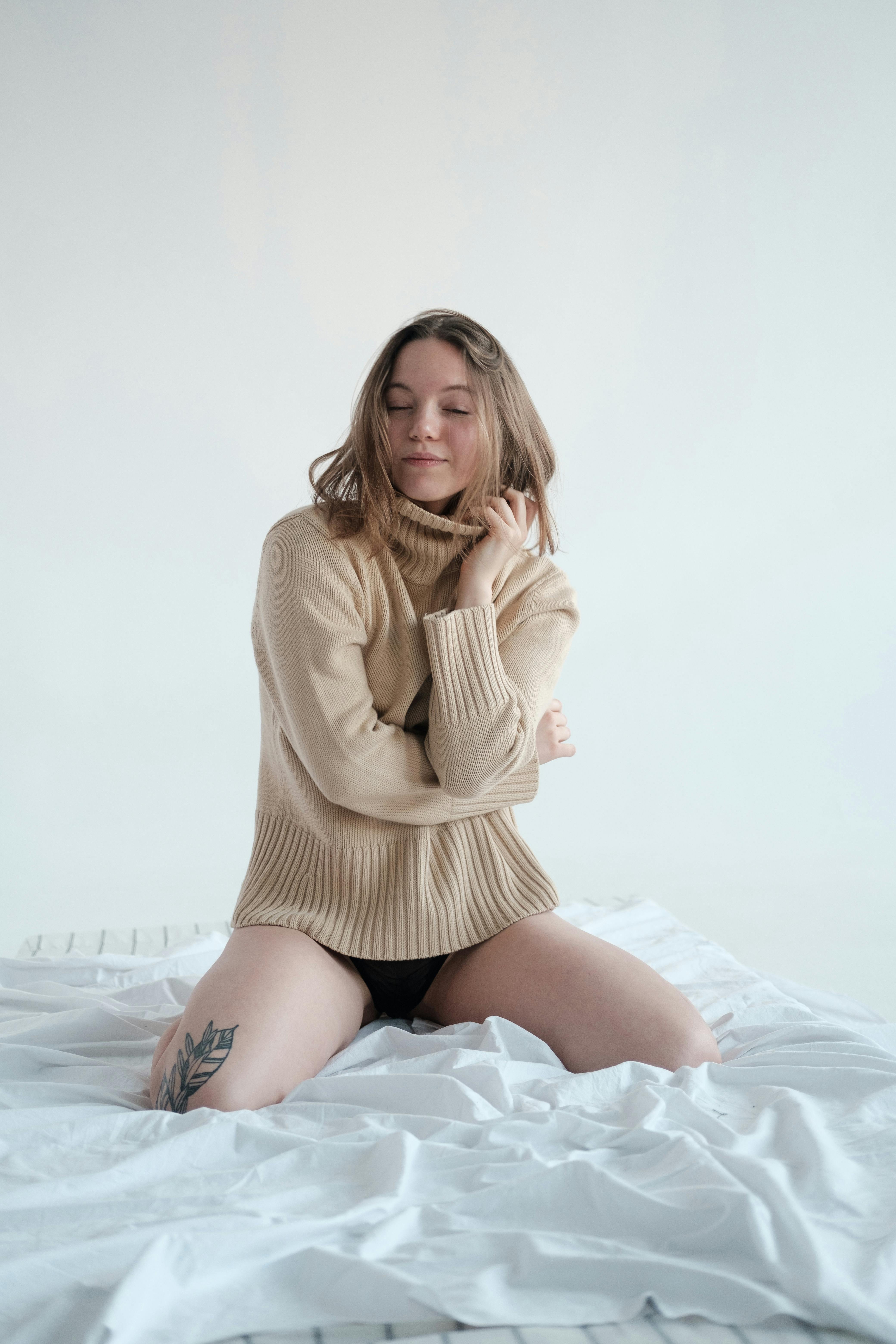 model wearing wool beige sweater