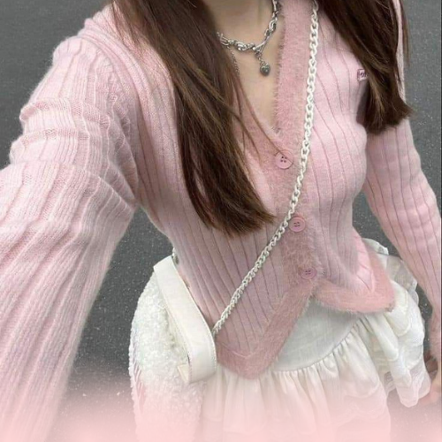 woman wearing light pink cute sweater