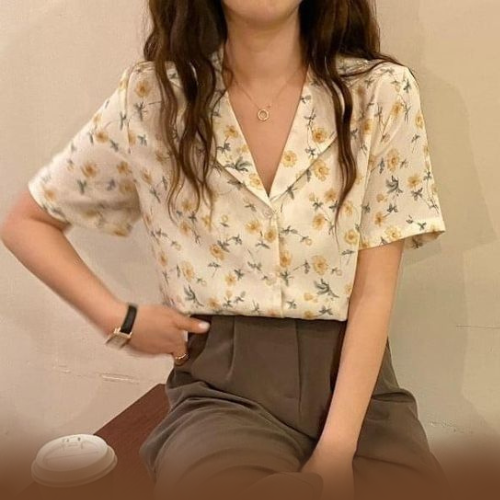 woman wearing flower print shirt