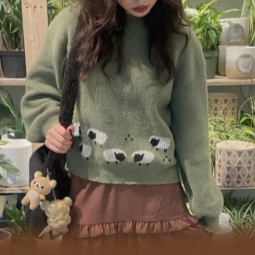 woman wearing green knit sweater