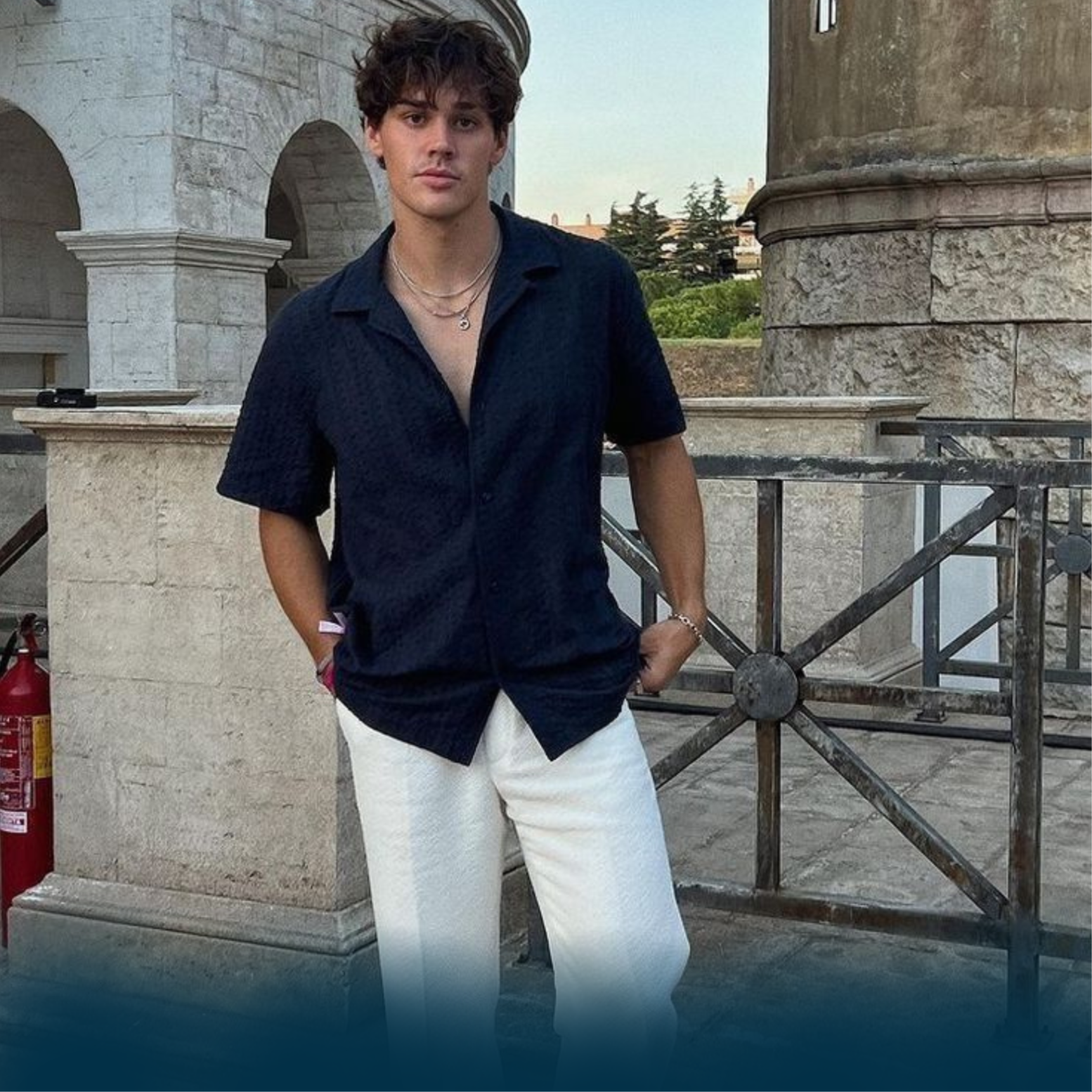 man wearing navy blue shirt