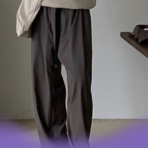 man wearing fancy black preppy pants