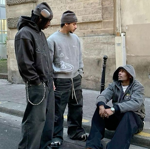 three friends wearing streetwear clothes