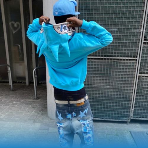 man posing with y2k outfit