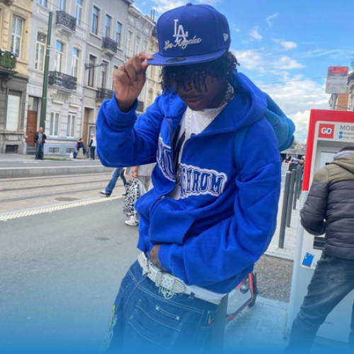 man wearing typical blue y2k clothes