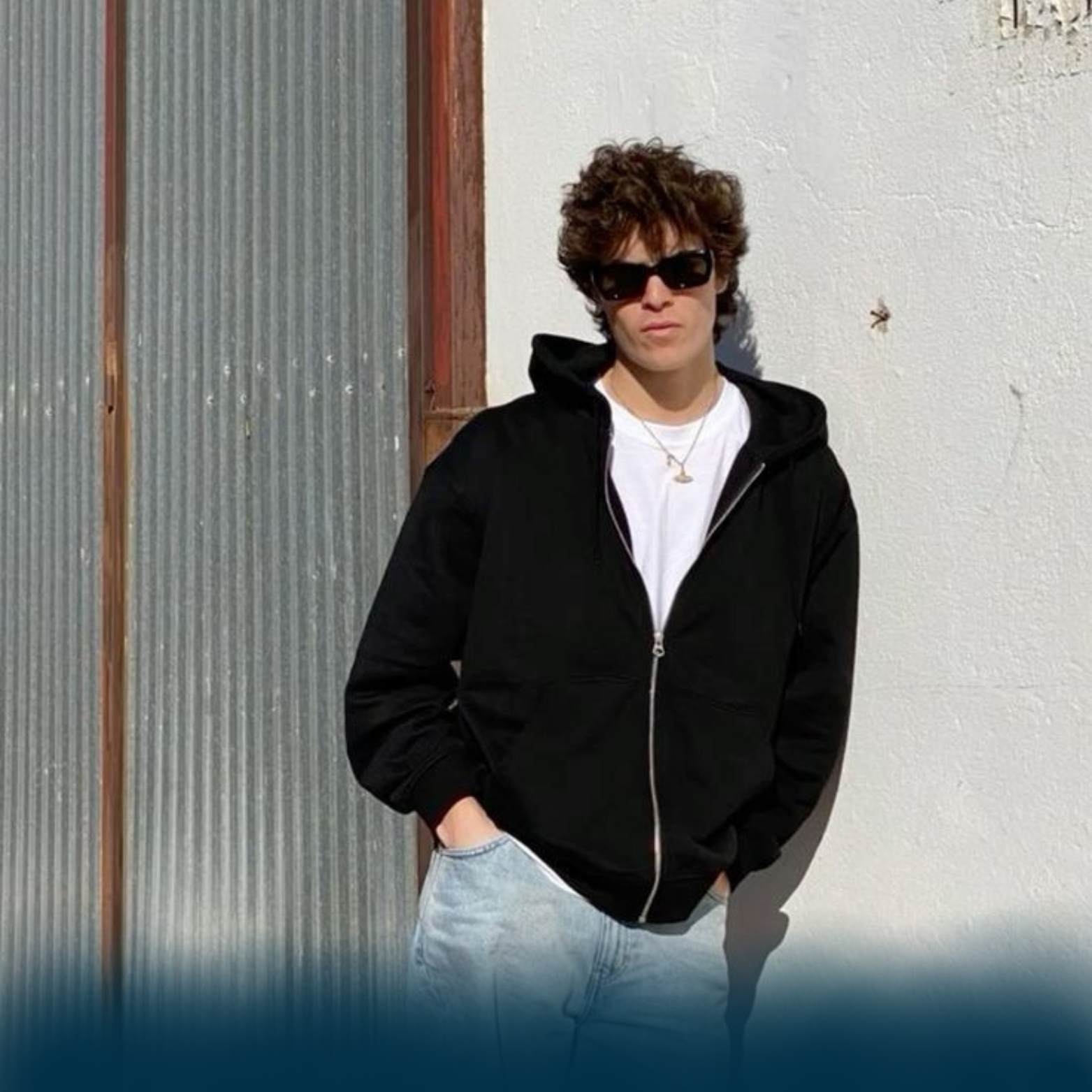 man wearing black old money hoodie
